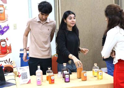 Visitors sampling flavored teas at Diwali Bazaar Jakarta by Gandhi Seva Loka.