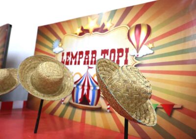 Straw hats on display for Lempar Topi carnival game at Diwali Bazaar Jakarta.