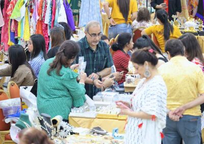 Visitors buying jewelry at Diwali Bazaar Jakarta by Gandhi Seva Loka.